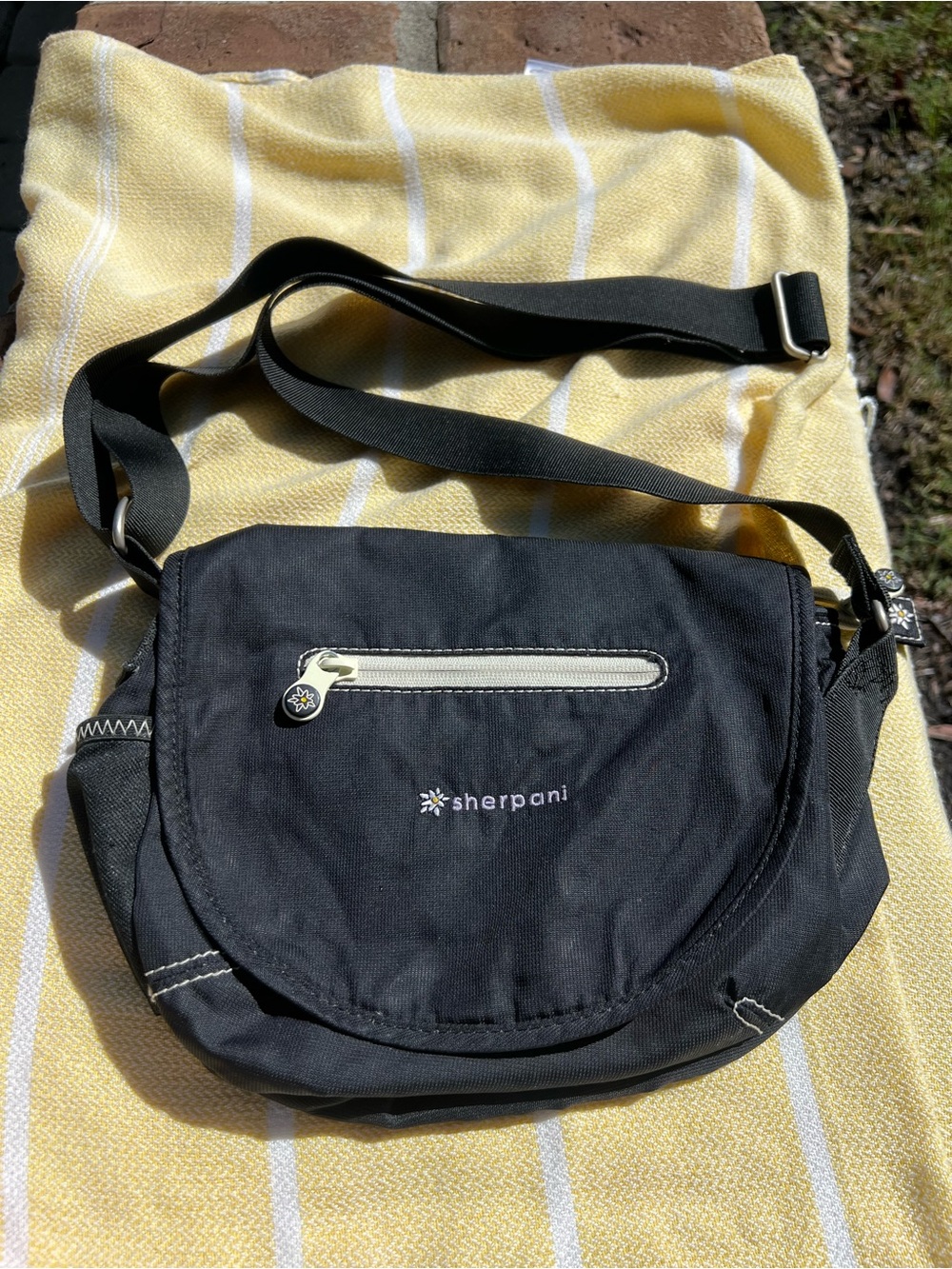 Sherpani Black Crossbody Messenger Bag with Cream Accent